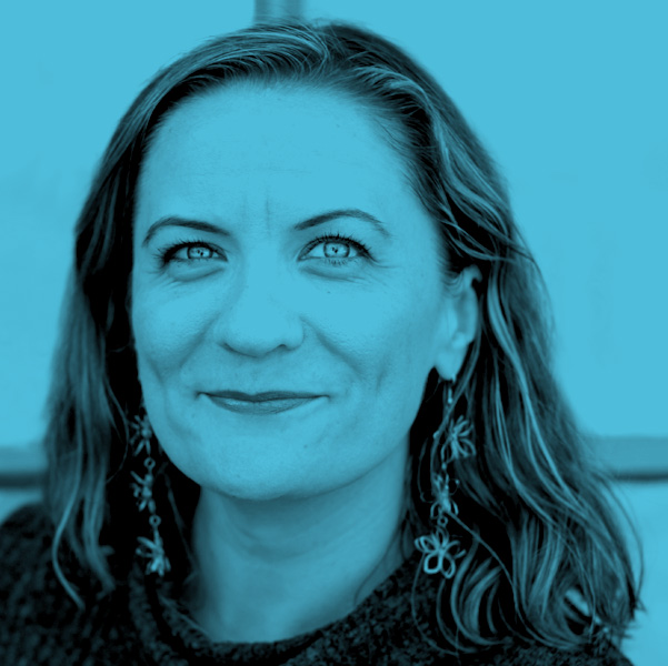Image Description: a blue filtered image of Kelly Zemnickis